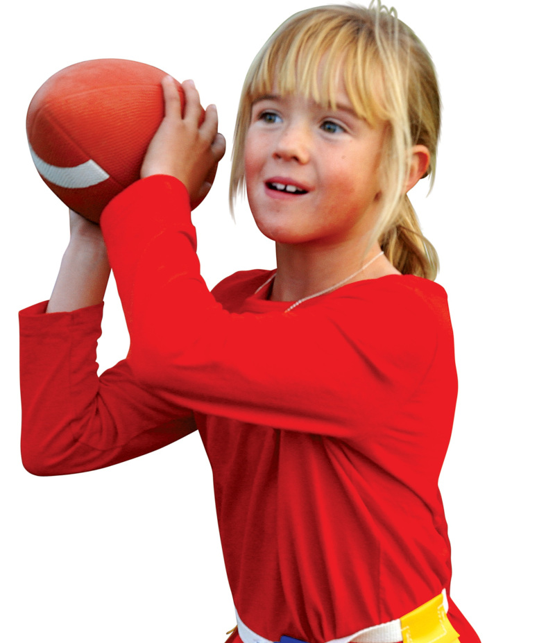 Girl getting ready to throw a football.